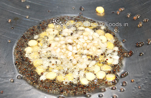 Heat oil in a pan add mustard & let it splutter, bengal gram, urad dal saute till light brown