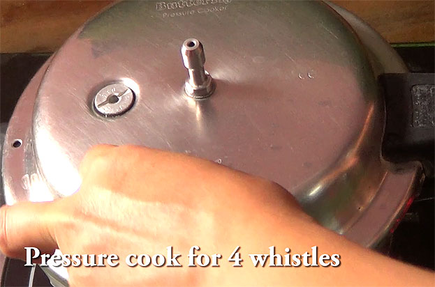 Cover lid, cook for 4 whistles