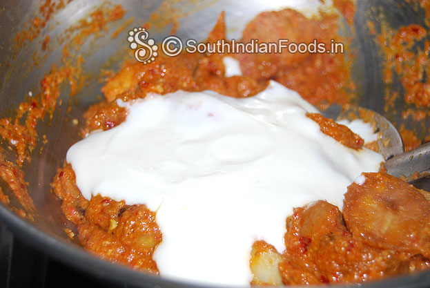 Add curd mix gently, cover lid & let it cook on low flame