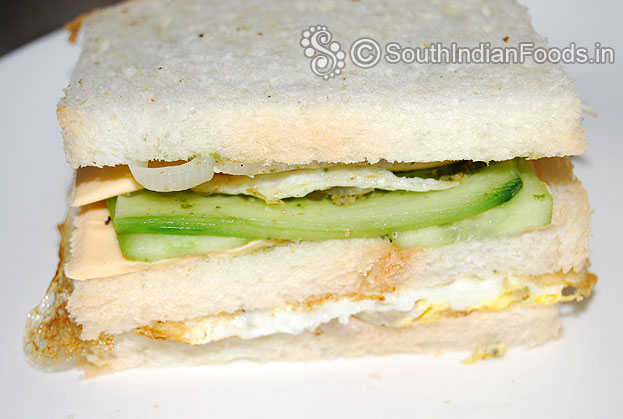 Place egg, cucumber and onion layers one by one. Now its ready to grill.