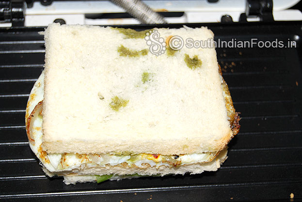 Preheat sandwich maker, place sandwich, close it and grill
