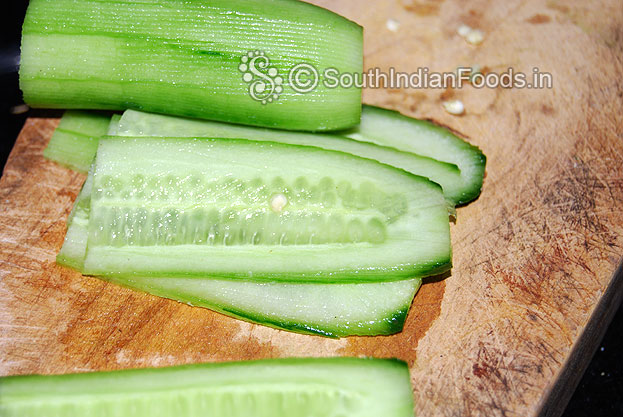 Peel off the cucumber skin & thinly slice