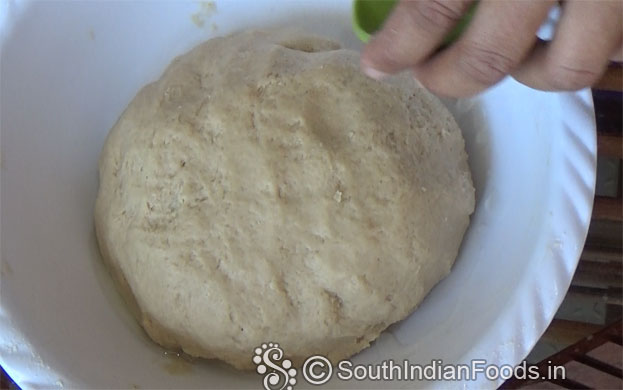 Add 1 tbsp oil sround the dough