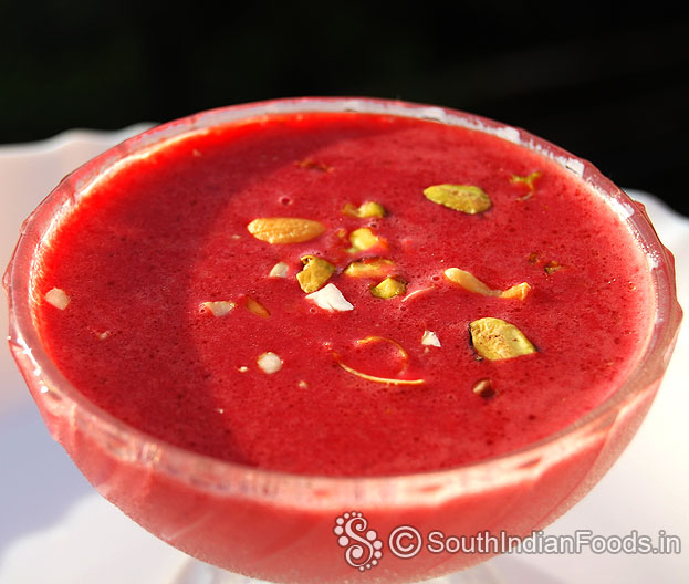 Beetroot badam pradhaman, garnish with roasted nuts, serve hot, warm or chilled