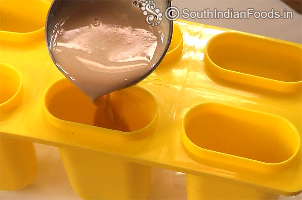 Pour cappucino mixture into the popsicle molds
