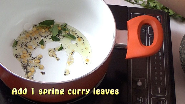 Add chana dal, urad dal, asafoetida, curry leaves
