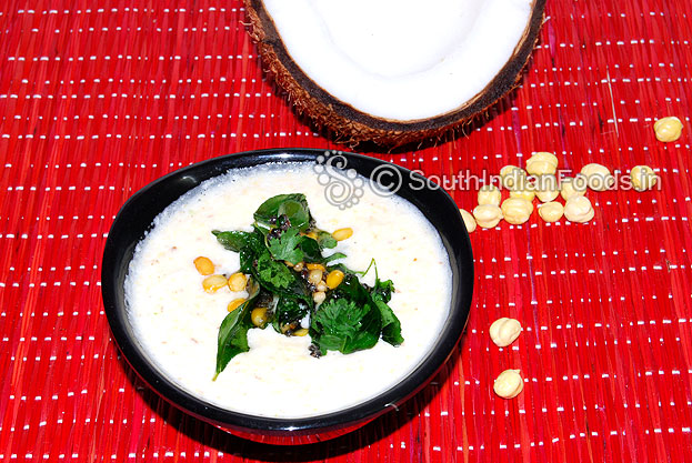 Add seasoned ingredients to freshly grount coconut mixture then serve with idli or dosa