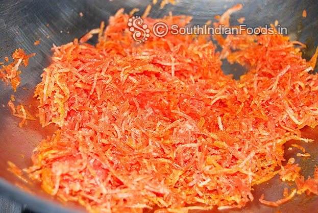 In the same pan add grated red carrot & saute till color becomes orange
