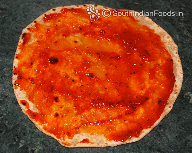 Grease chapati with pasta sauce