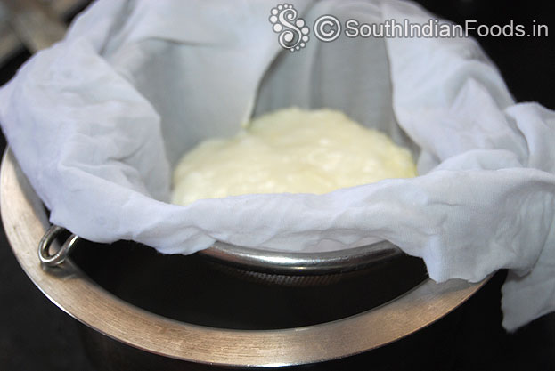 Place fresh curd in a cotton cloth