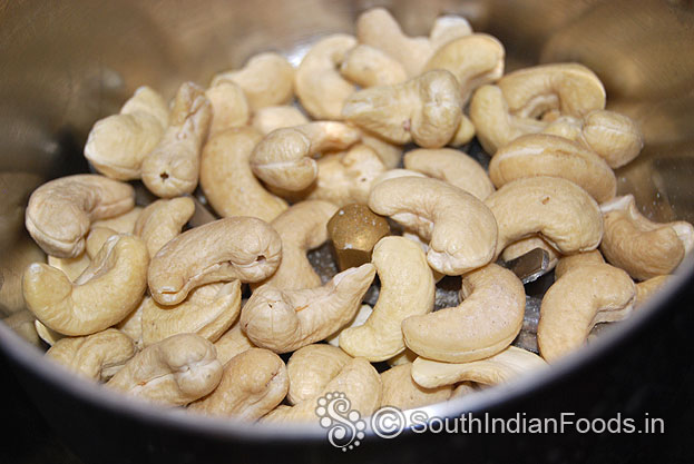 Put cashews in a mixer jar, grind to fine powder