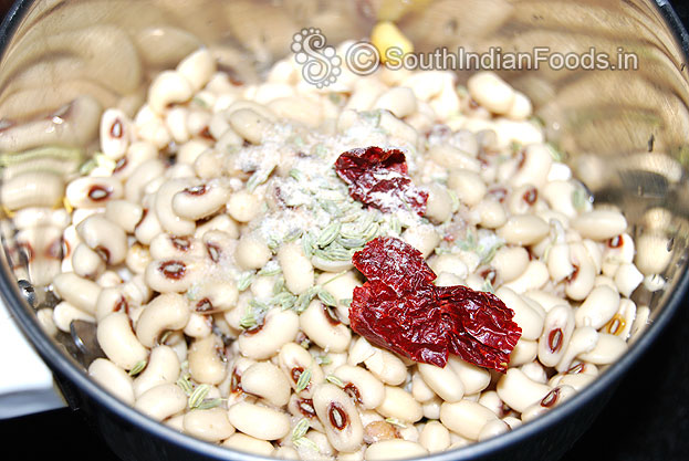Put soaked karamani, Dry red chilli, Asafetida, salt & fennel seeds in mixer jar