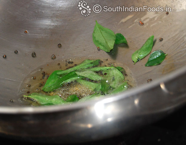 Heat oil add mustard, urad dal & curry leaves