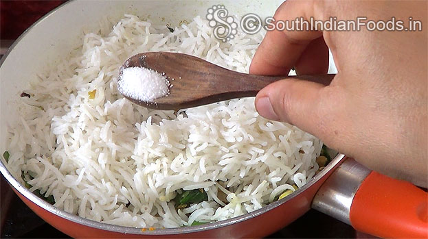 Add rice & salt, mix well