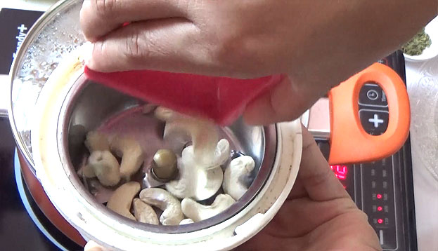 In a mixie jar, add cashews