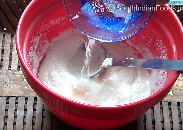 In a bowl add white rava & salt