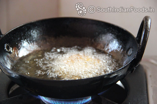 Heat oil put prepared sago potato vada deep fry