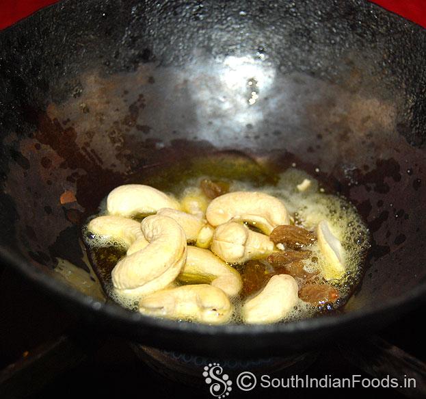 Add cashews, raisins roast till light brown