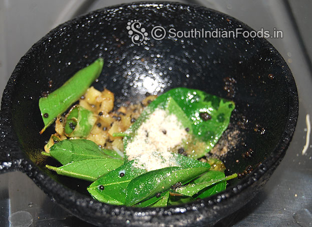 Seasoning with mustard seeds, ginger, green chilli, curry leaves & asafetida