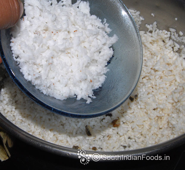 In a mixie jar add soaked raw rice, coconut, cardamom grind