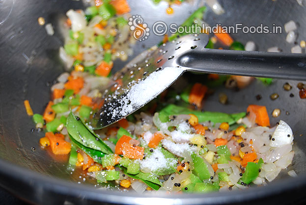 Add carrot , capsicum & salt saute