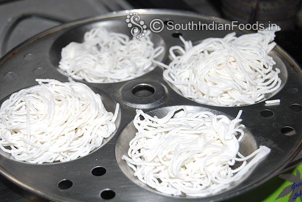 Idiyappam strings in idli plates, steam it for 10 min