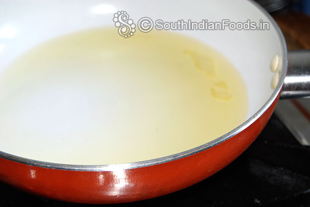 Heat oil and ghee in a pan