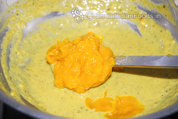 Add mango paste mix well