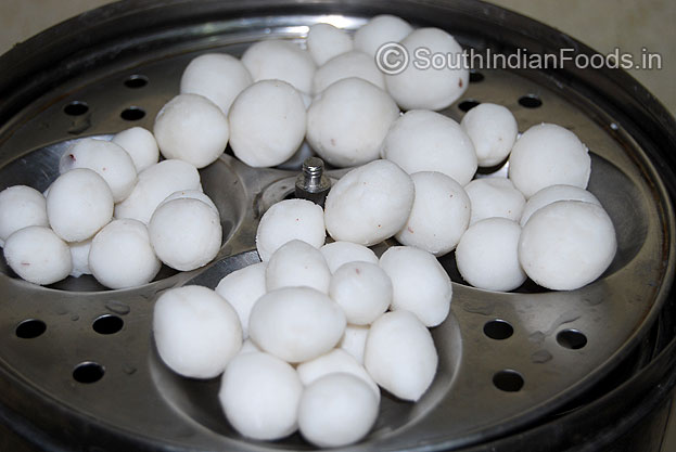 Divide the dough into equal size balls & steam it in idli cooker for 5 min