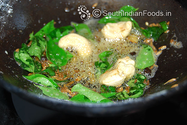 Heat ghee in a pan, add seasoning ingredients, cumin, peppercorns, green chilli,  ginger, cashew nuts, curry leaves