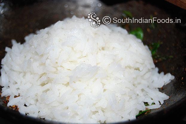 Add boiled rice & salt mix well