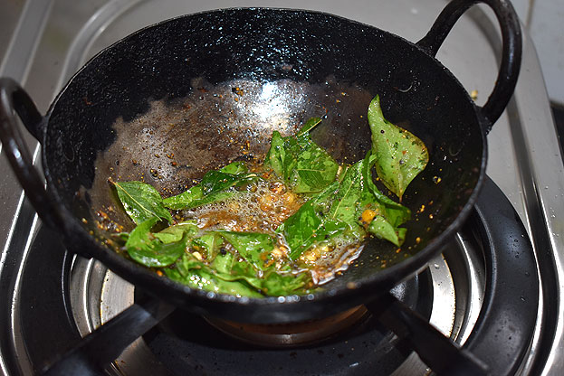 Heat pan with oil, add mustard, chana dal, urad dal, hing, fenugreek powder
