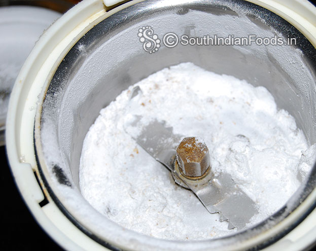 Add green cardamom, sugar in a mixer jar & grind to smooth powder