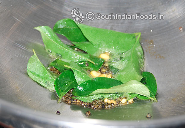Heat oil, add mustard, bengal gram, urad dal & curry leaves saute