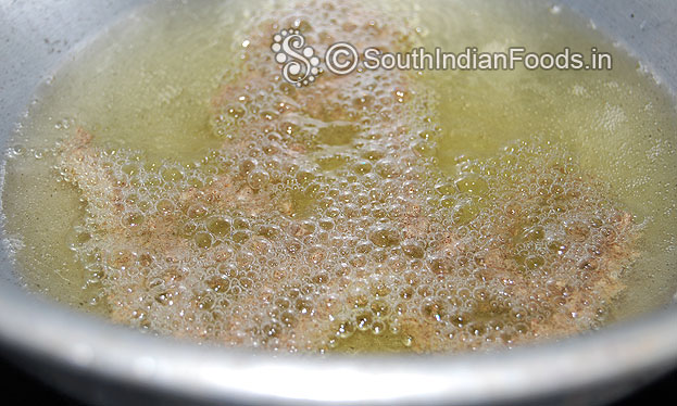 Heat oil in a pan squeeze over the oil & deep fry till crisp on both sides