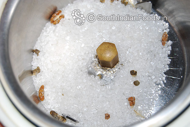 Add sugar cardamom seeds in a mixer jar & grind to fine powder