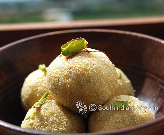 Rava laddus are ready garnish with pistachios & saffron, let it cool & store it in an airtight container use within 5 days