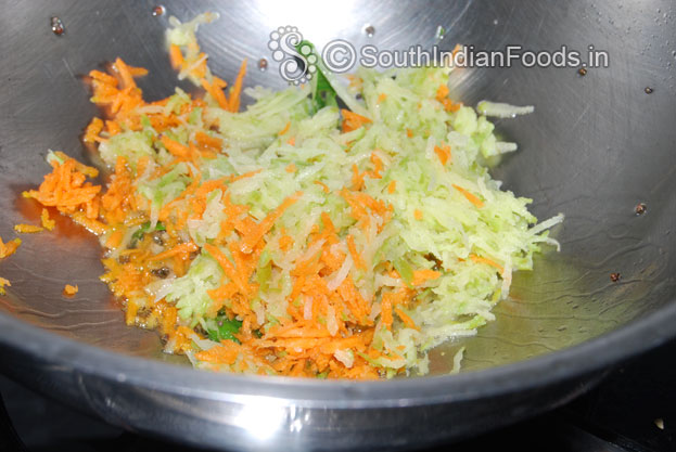 Add curry leaves, grated mango, carrot saute