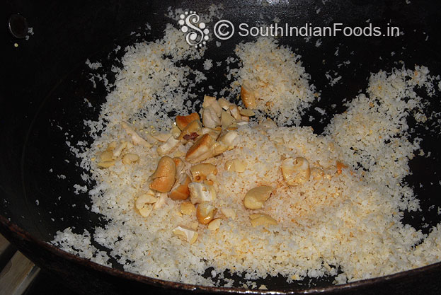 In a bowl add desiccated coconut & roasted nuts