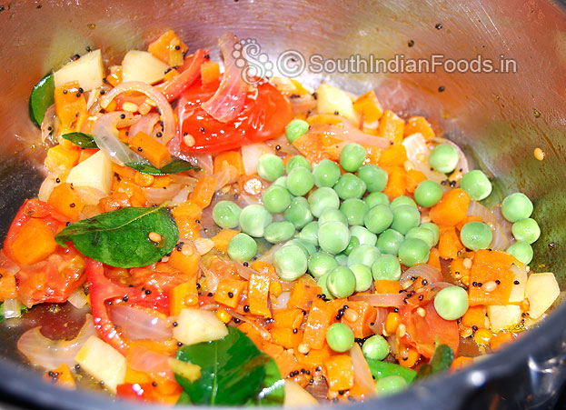 Add green peas, salt & saute