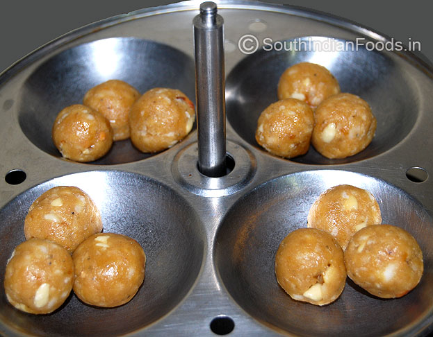 Wheat peanut balls in idli cooker