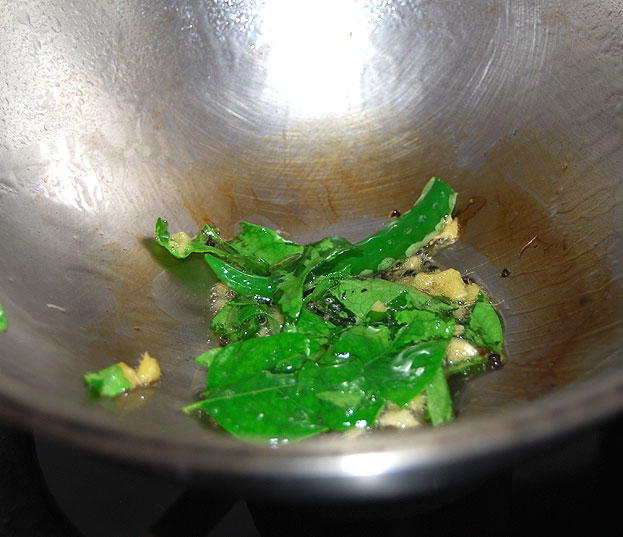 Heat 1 tbsp oil, add mustard, curry leaves, green chill, ginger 