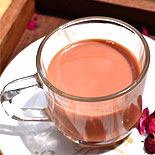 Rose tea with milk and rose syrup