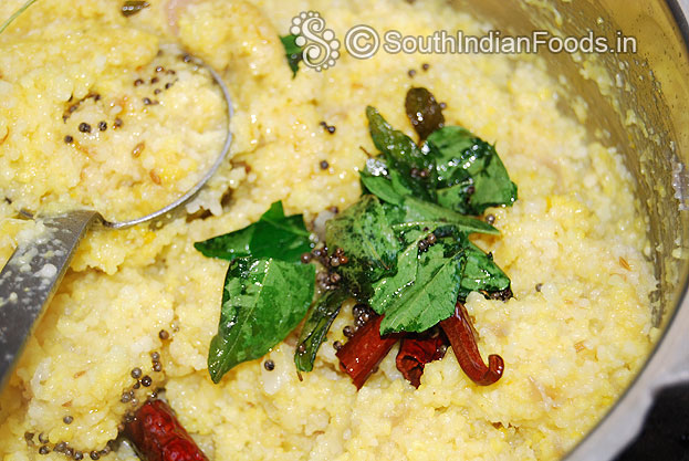 Add seasoned ingredients mix well. Finally add 2 tbsp of gingelly oil mix well & serve hot