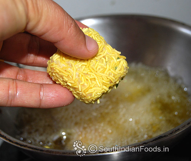 Drop it in hot oil, deep fry till crisp and golden brown