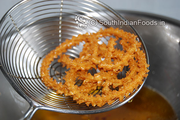 Murukku is ready take it out & drain on absorbent paper