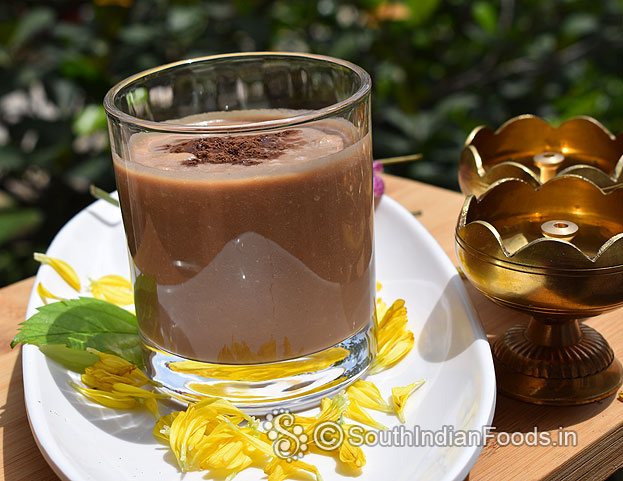 Apple chocolate milkshake with cocoa powder