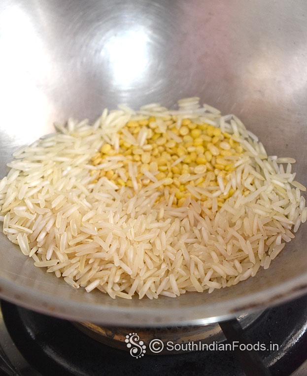 Heat pan add moong dal and rice