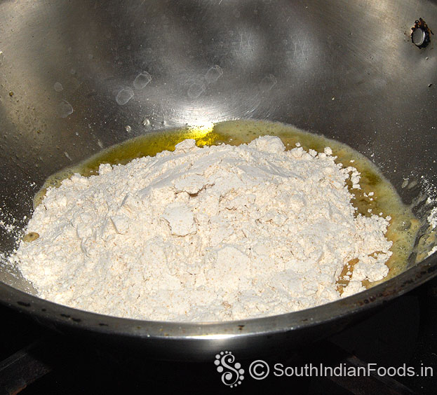 Heat ghee, add wheat flour, saute till you you get nice aroma