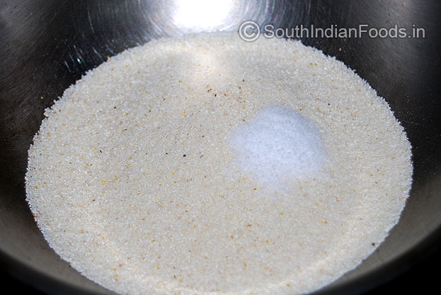 In a bowl add rava semolina and salt